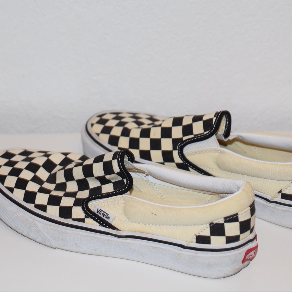 Vans White and Black Slip-On Sneakers